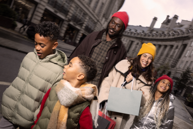 Family walking down Regent Street curve 