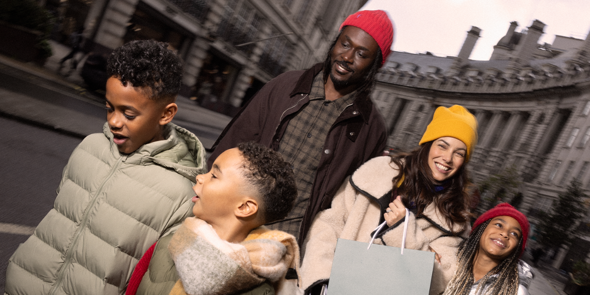 Family walking down Regent Street curve 