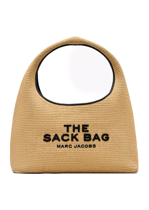 Light jute woven handbag with black lettering which says "The Sack Bag Marc Jacobs"