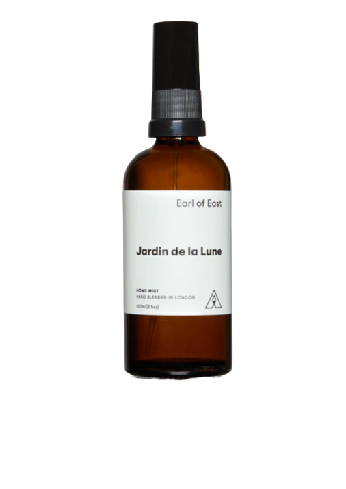 Home mist in a brown bottle with black cap, and whote sticker label which says "Jardin de la Lune"