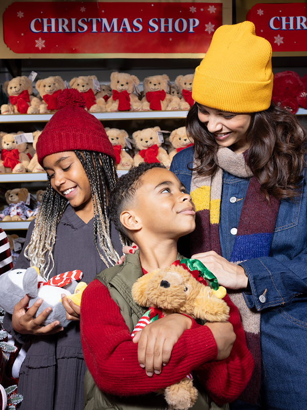 Family in Christmas shop